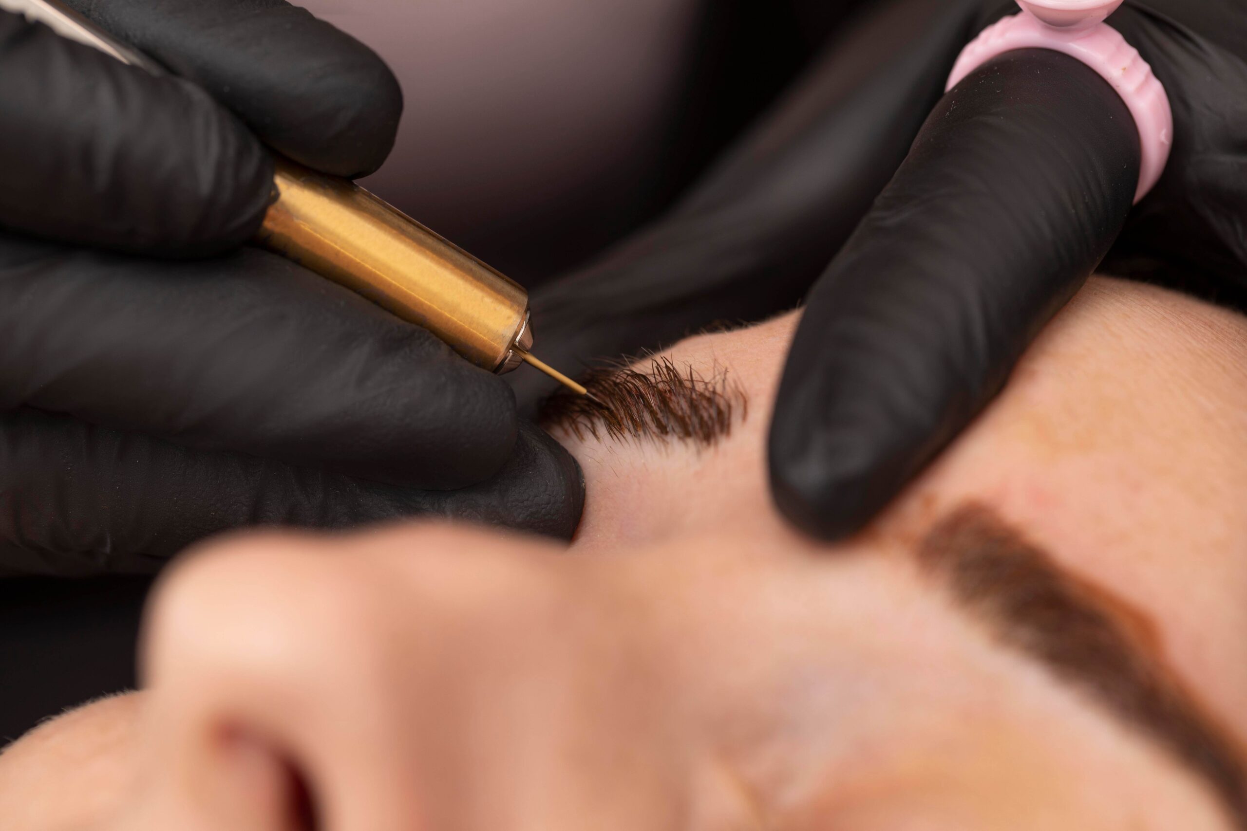 female going through microblading treatment 2 1 scaled